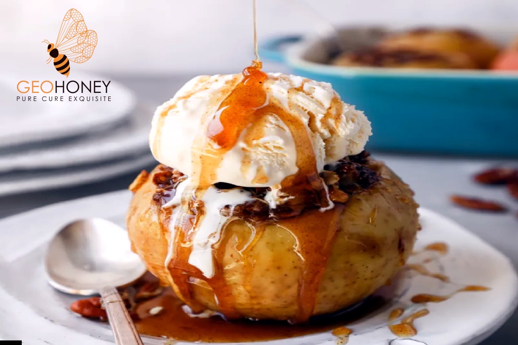 Close-up of Honey & Cinnamon Baked Apples, with a golden-brown crust and a sprinkle of cinnamon on top.